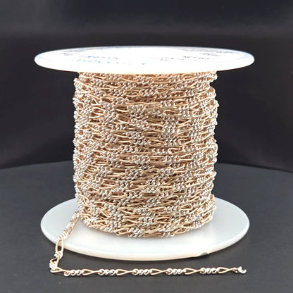 XM/2531CTT. 14k Gold Filled and Sterling Silver 1 Long and 3 Short Link Chain: 1 Ft. / 6.1mm-7mm / Figaro