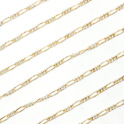 XM/2531CTT. 14k Gold Filled and Sterling Silver 1 Long and 3 Short Link Chain: 1 Ft. / 6.1mm-7mm / Figaro