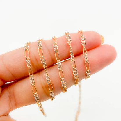 XM/2531CTT. 14k Gold Filled and Sterling Silver 1 Long and 3 Short Link Chain: 1 Ft. / 6.1mm-7mm / Figaro